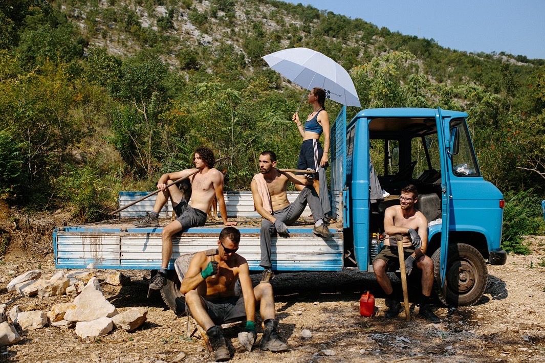 Climbers hanging out together at the crag