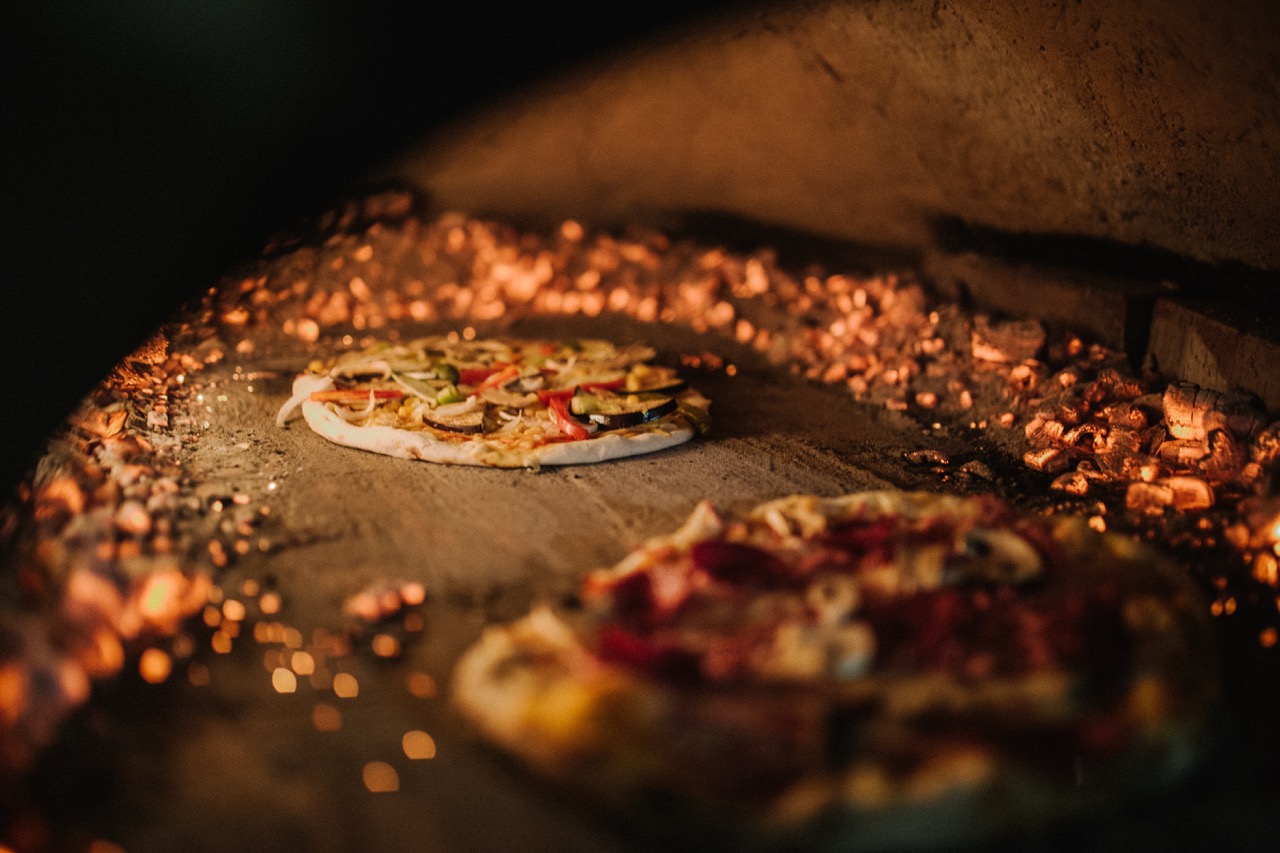 Fresh pizzas shared at pizza night